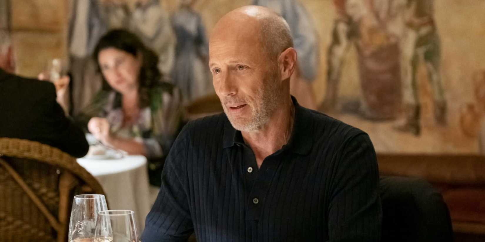Greg (Jon Gries) sitting in a restaurant in The White Lotus season 2